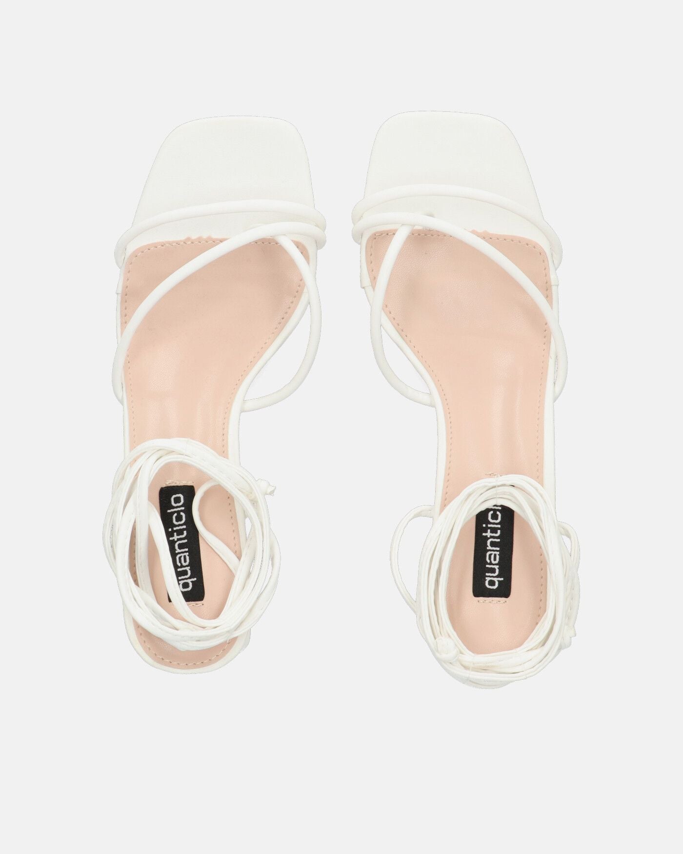 HOARA - heeled sandals in white PU
