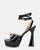 JANINE - high heels with platform in black glassy and bow with gems